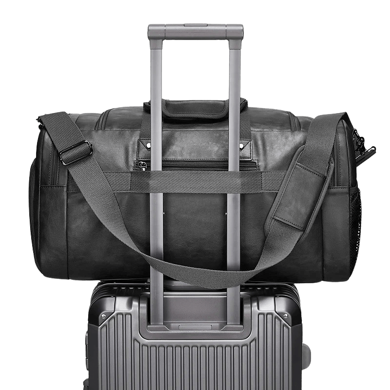 Valmont bag attached to luggage handle for easy travel